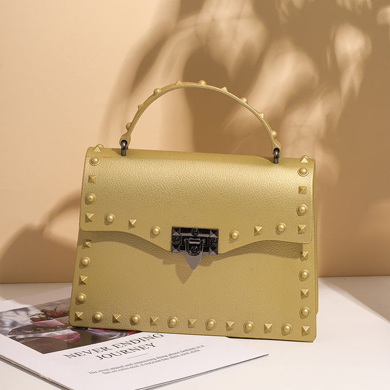 Sac à main en PVC eprolo avec rivets colorés, bandoulière diagonale, élégant et pratique pour femmes.