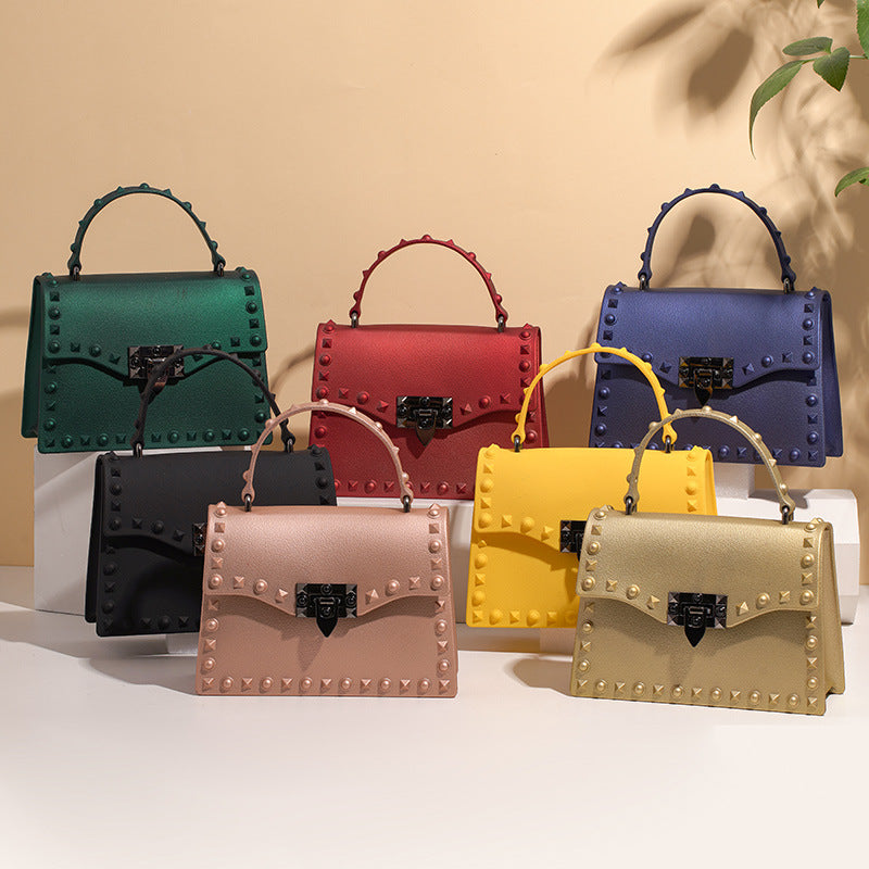 Sac à main en PVC pour femmes eprolo, sac coloré à rivets en diamant, porté à la main ou en diagonale, style moderne.